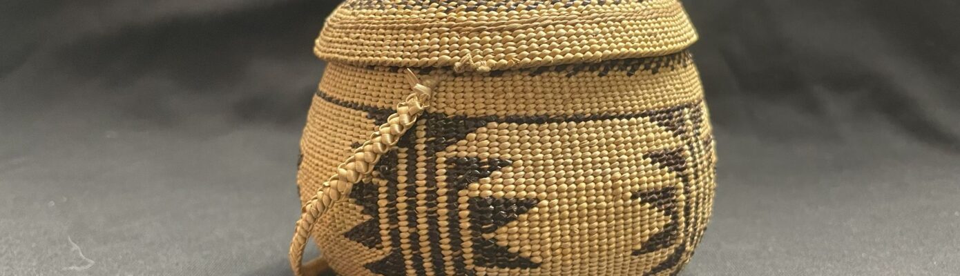 Photo of an Indigenous hand-woven basket at the Clarke Museum